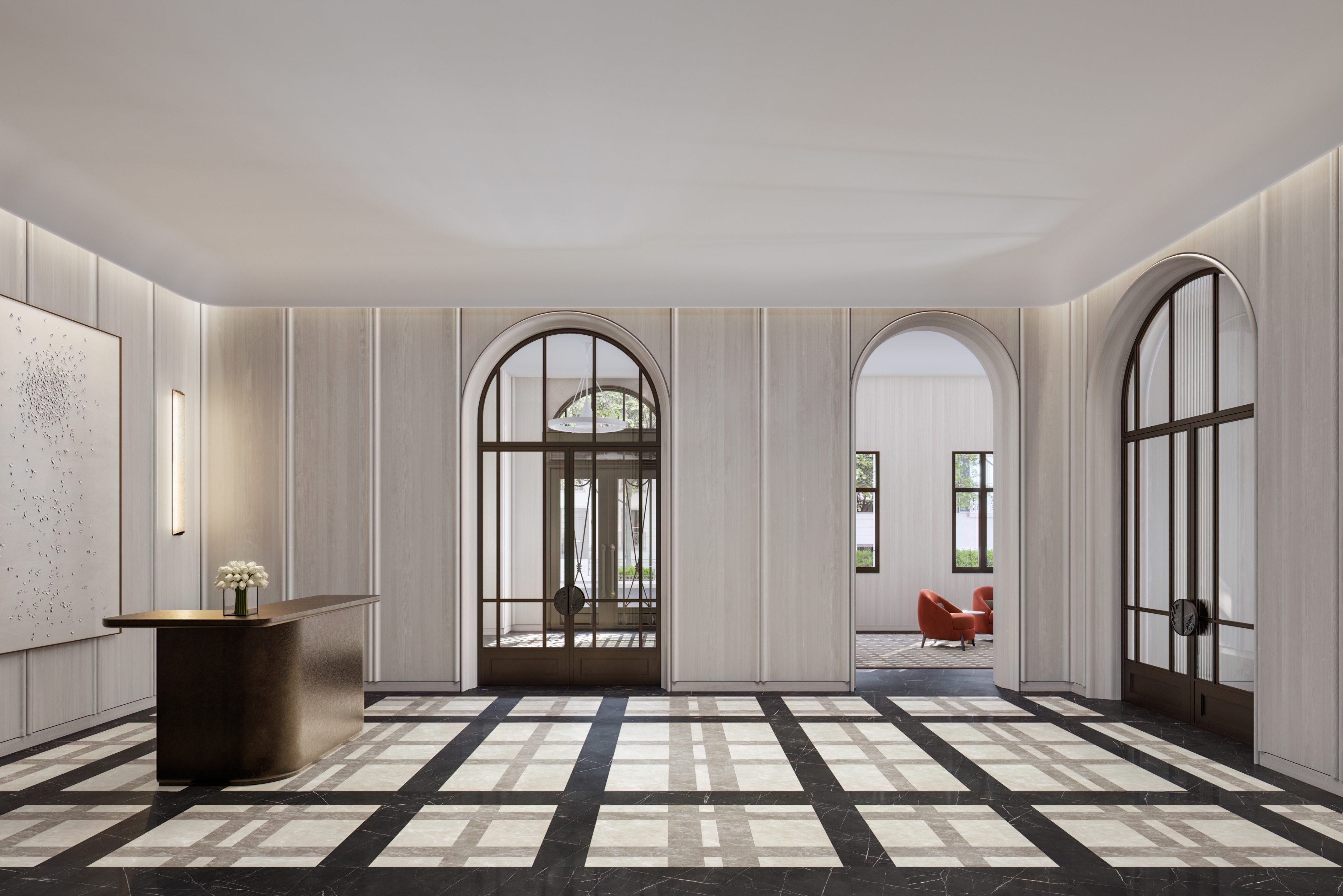 Elegant lobby with black and white flooring and front desk, located at 255 East 77 Upper East Side condominiums.